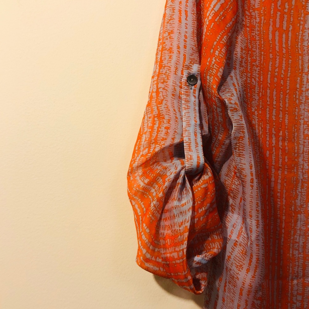ZOA New York sheer v-neck blouse.
